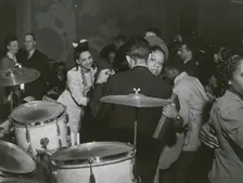 View of crowd dancing to the music of "Red" Sounders and his band, at the Club DeLisa..., April 1942 Creator: Jack Delano