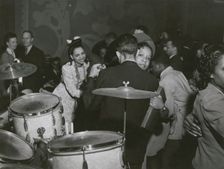 View of crowd dancing to the music of "Red" Sounders and his band, at the Club DeLisa..., April 1942 Creator: Jack Delano