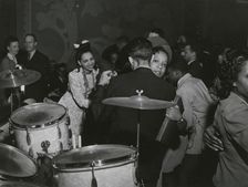 View of crowd dancing to the music of "Red" Sounders and his band, at the Club DeLisa..., April 1942 Creator: Jack Delano