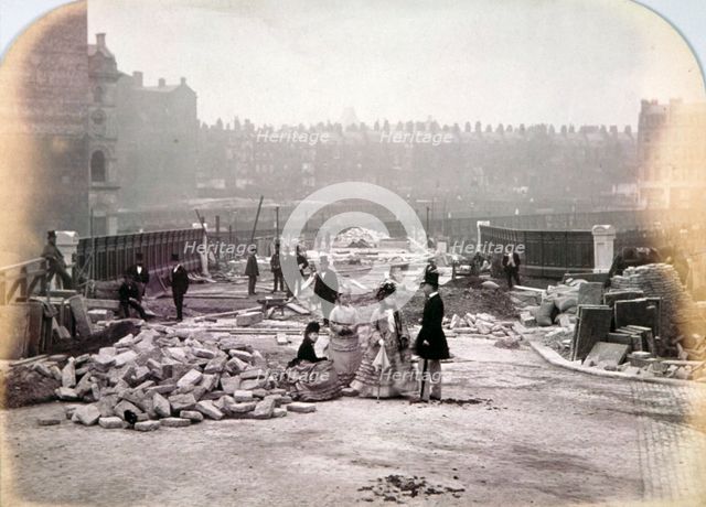 View of figures on Holborn Viaduct during its construction, City of London, 1870. Artist: Henry Dixon