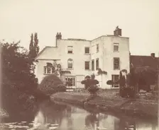 View of House from Garden by Pond with Lily Pads, 1850s. Creator: Unknown