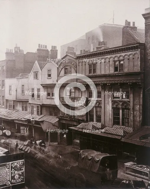 View of houses and shops in Aldersgate Street, 1879. Artist: Henry Dixon
