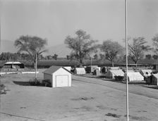 View of Kern migrant camp, community center at left, California, 1936. Creator: Dorothea Lange