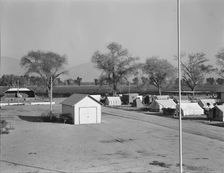 View of Kern migrant camp, community center at left, California, 1936. Creator: Dorothea Lange