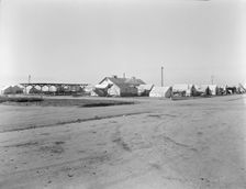 View of Kern migrant camp...sanitary units, CA, 1936. Creator: Dorothea Lange