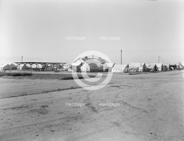 View of Kern migrant camp...sanitary units, CA, 1936. Creator: Dorothea Lange.
