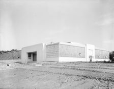 View of nearly completed factory for garment workers, Hightstown, New Jersey, 1936. Creator: Dorothea Lange