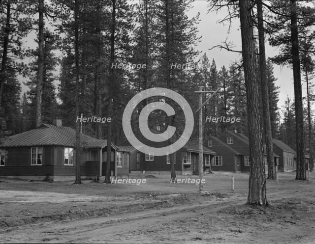 View of new model company lumber town housing for millworkers. Gilchrist, Oregon, 1939. Creator: Dorothea Lange.