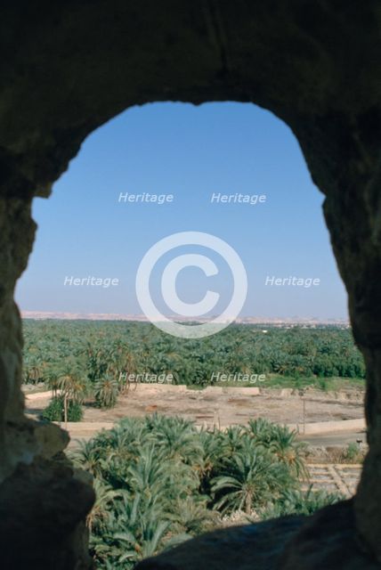 View of Siwa from Aghurmi, Egypt, 1992.  Creator: Vivienne Sharp.