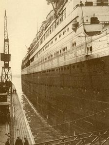 View of Starboard Side of the "Majestic" As She Entered the Floating Dry Dock c1930. Creator: Unknown