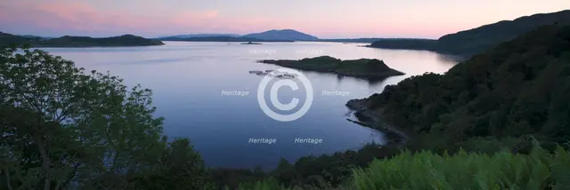 View over Seil Sound to a salmon farm and Luing, Slate Islands, Argyll and Bute, Scotland.  Creator: Peter Thompson.