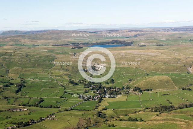 View over the village of Malham towards Malham Cove and Malham Tarn, North Yorkshire, 2019. Creator: Historic England.