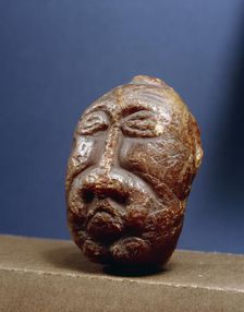Viking amber head, Denmark. Artist: Werner Forman
