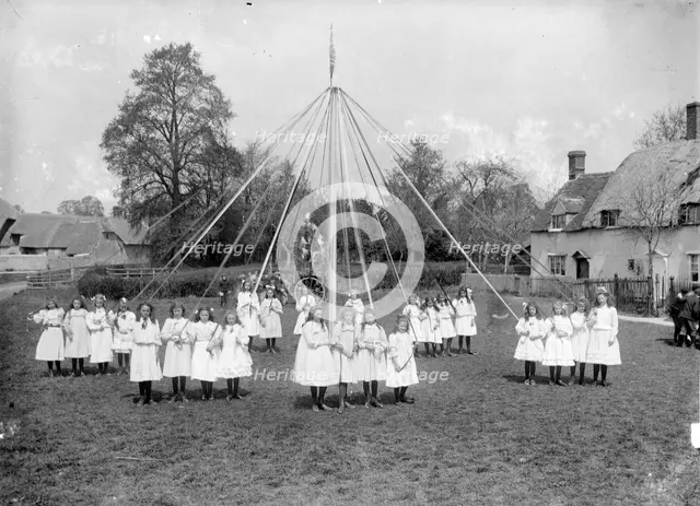 Village children taking part in the maypole dance at East Hanney, Oxfordshire, c1860-c1922. Artist: Henry Taunt