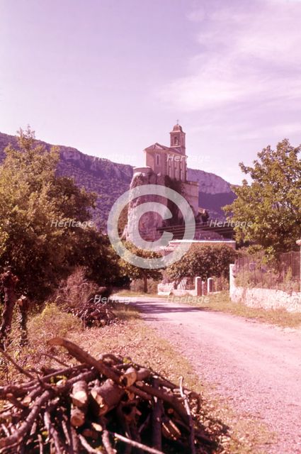Village church perched on rock, Pierrelongue, France, c1955.  Creator: Arthur Charles Kirby Ware.