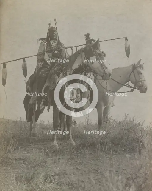 Village criers on horseback, Bird On the Ground and Forked Iron, Crow Indians, Montana, c1908. Creator: Edward Sheriff Curtis.
