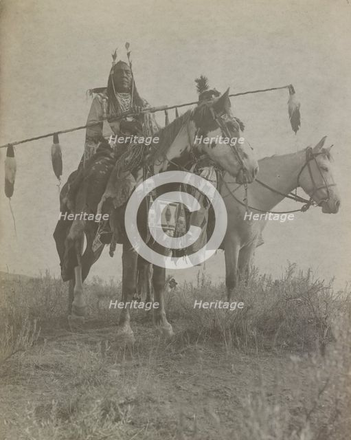 Village criers on horseback, Bird On the Ground and Forked Iron, Crow Indians, Montana, c1908. Creator: Edward Sheriff Curtis.