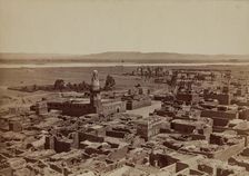 Village of Edfu, View Taken from the Pylon of the Temple, late 19th century. Creator: Henri Bechard
