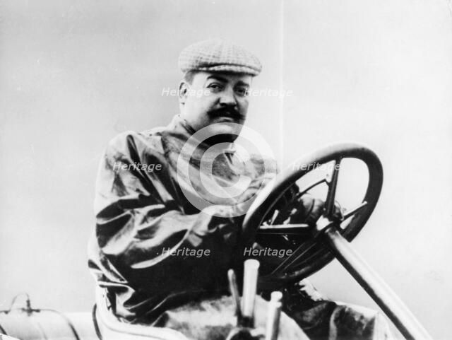 Vincenzo Lancia at the wheel of a car. Artist: Unknown