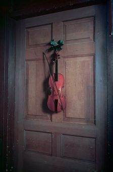 Violin on a door painted by Jan van der Vaart, Chatsworth House, Derbyshire, c1955. Creator: Arthur Charles Kirby Ware
