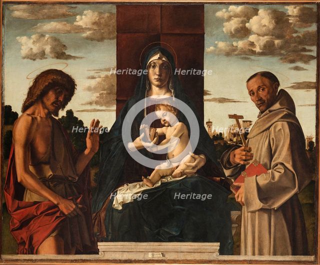 Virgin and Child with Saints Francis and John the Baptist.
