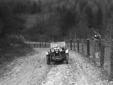 Viscount Curzon's MG M type 12/12 replica competing in the Inter-Varsity Trial, November 1931. Artist: Bill Brunell