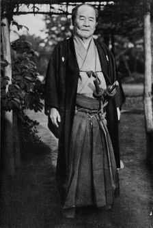 Viscount Shibusawa, (1840-1931) wearing his samurai swords c1900, (1921). Artist: Julian Leonard Street
