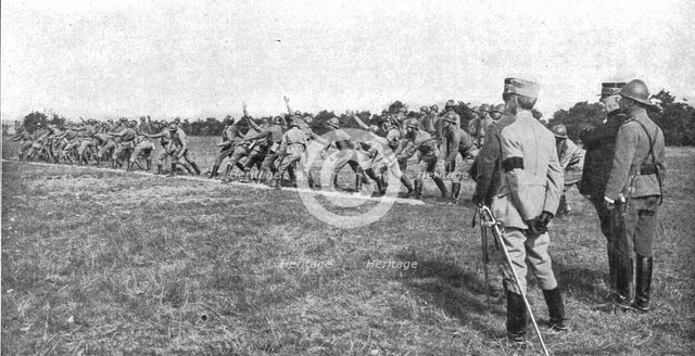 ''Visite du general Joffre aux troupes Russes en Champagne; Le lancement des grenades', 1916. Creator: Unknown.