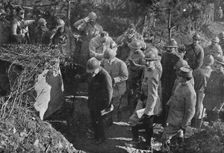 Visite presidentielle au front de Woevre; au retour des premieres lignes : a gauche..., 1916. Creator: Unknown