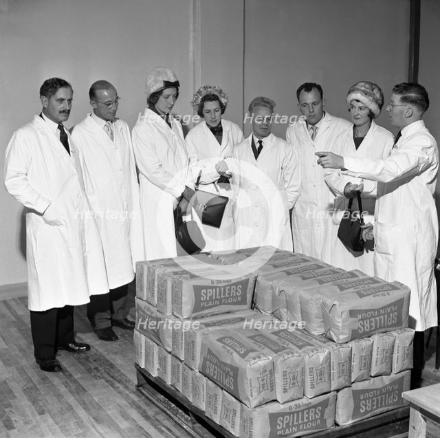 Visitors at the Spillers Foods mill, Gainsborough, Lincolnshire, 1962. Creator: Michael Walters.