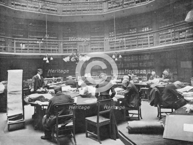 Visitors searching through volumes at the Public Record Office, Chancery Lane, London, 1903. Artist: Unknown.
