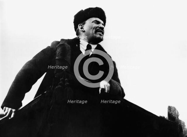 Vladimir Ilich Lenin, Russian Bolshevik revolutionary leader, speaking from a rostrum, 1917. Artist: Unknown