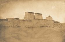 Vue des Pylones du Temple Khons et d'une partie du village de Karnac, 1849-50. Creator: Maxime du Camp