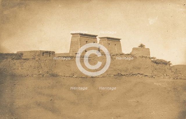 Vue des Pylones du Temple Khons et d'une partie du village de Karnac, 1849-50. Creator: Maxime du Camp.