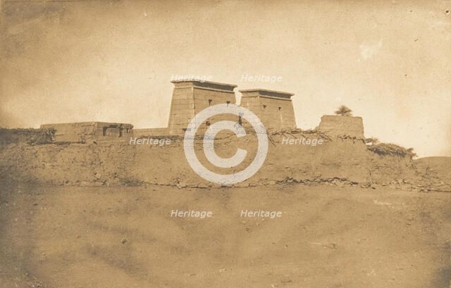 Vue des Pylones du Temple Khons et d'une partie du village de Karnac, 1849-50. Creator: Maxime du Camp.