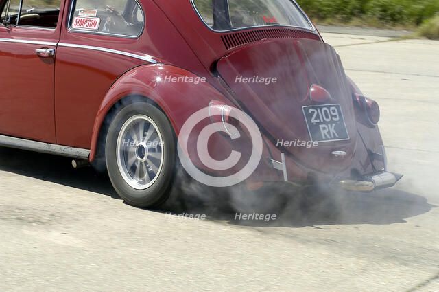 VW Beetle Burning out. Artist: Unknown.