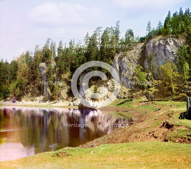 Vysokiy Rock below the village of Treki, Chusovaya River, 1912. Creator: Sergey Mikhaylovich Prokudin-Gorsky.
