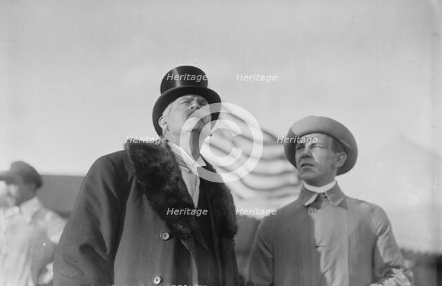 W. Wellman with unidentified gentleman at aviation meet, 1910. Creator: Bain News Service.