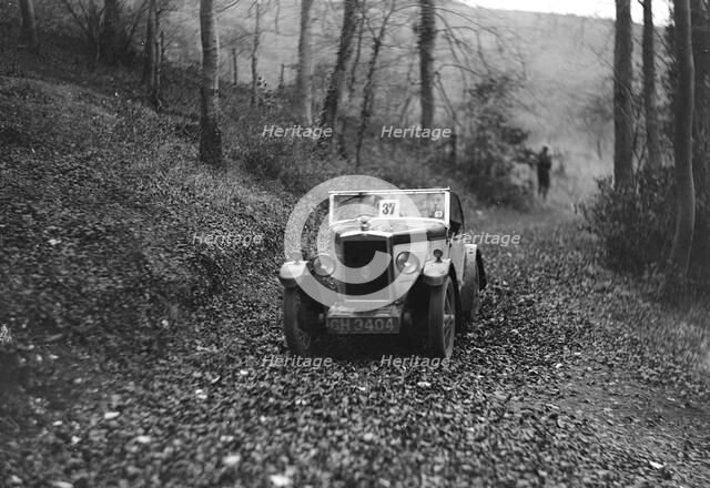 W Wright's Morris Minor with body by Arrow competing in the Inter-Varsity Trial, November 1931. Artist: Bill Brunell.