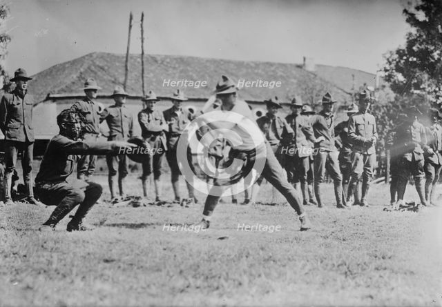 Y.M.C.A. hut in France, soldiers' ball game, 1917 or 1918. Creator: Bain News Service.