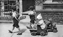 Young children playing in the street, London, 1926-1927