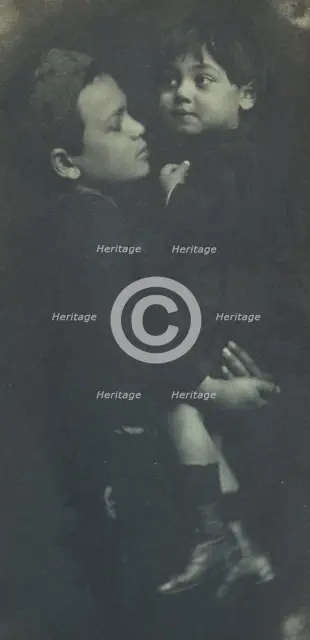 Young boy holding a smaller child, c1900. Creator: Elizabeth B. Brownell.
