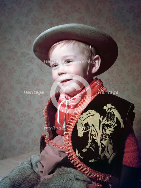 Young boy in a cowboy outfit, c1955.  Creator: Arthur Charles Kirby Ware.