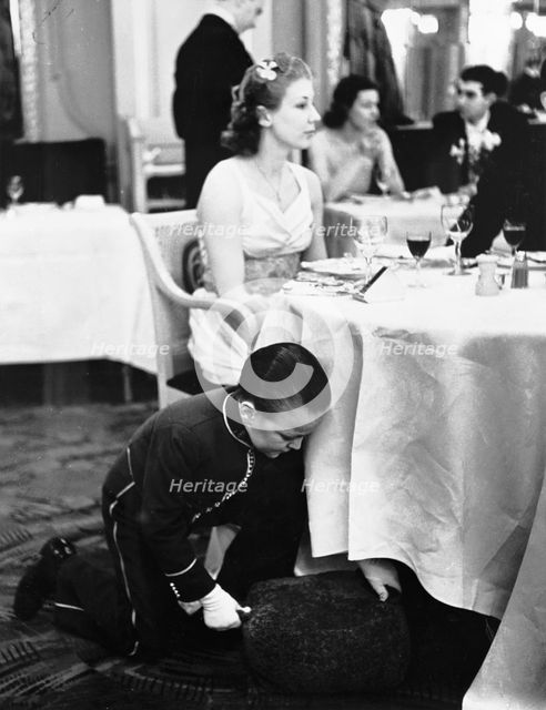 Young boy working at the Trocadero Restaurant, Leicester Square, Westminster, London, 1939. Creator: Unknown.
