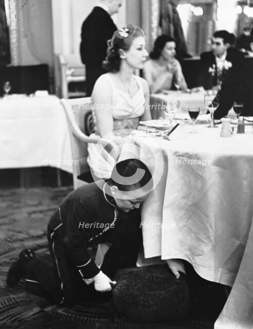 Young boy working at the Trocadero Restaurant, Leicester Square, Westminster, London, 1939. Artist: Unknown