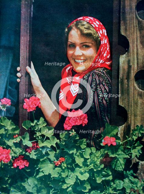 Young German woman at a window, 1943. Artist: Unknown