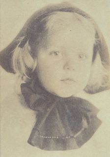 Young girl with a hat tied with a large bow, head-and-shoulders portrait, facing front, c1900. Creator: Eva Watson-Schutze