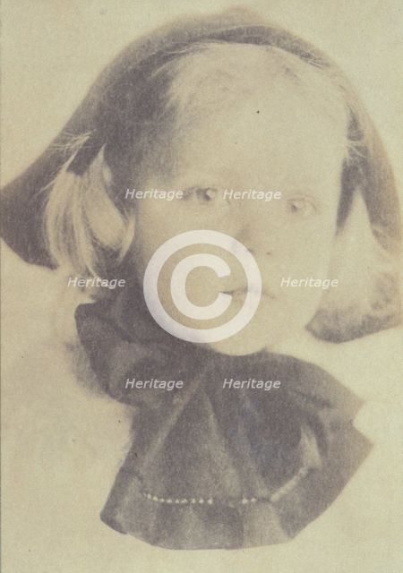 Young girl with a hat tied with a large bow, head-and-shoulders portrait, facing front, c1900. Creator: Eva Watson-Schutze.
