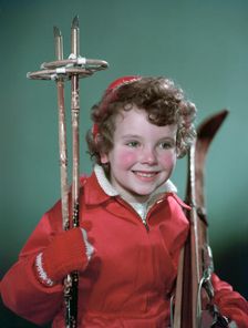 Young girl with cross-country ski equipment, c1955. Creator: Arthur Charles Kirby Ware