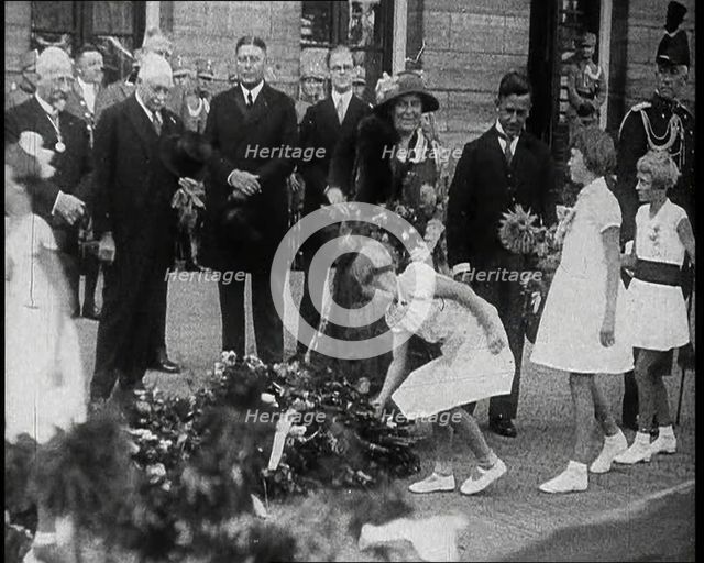Young Girls Leaving Flowers in a Pile for Wilhelmina, Her Majesty the Queen of the Netherlands,1930s Creator: British Pathe Ltd.